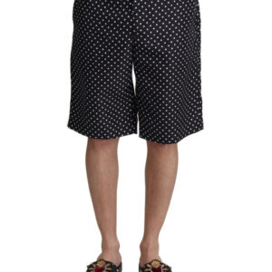 Make a stylish splash with our Dolce & Gabbana Polka Dot Swim Trunks! These swimming trunks provide not only a sleek design with an eye-catching polka dot print