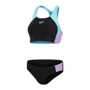 Bringe den Farbblock-Stil in dein Schwimmtraining. Mit diesem sportlichen Zweiteiler mit attraktiven Seiteneinsätzen in Blockfarben kannst du dein Workout stylisch und bequem meistern. Das Racerback-Design unterstützt die Schulterbewegung