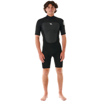 **Bereite Dich mit dem Omega 2/2 Shortyanzug von Ripcurl auf Deine nächste Surfsession vor.** Dieser Neoprenanzug hat einen Reißverschluss im Rücken und besteht zu 80% aus Neopren und zu 20% aus Polyamid. Er enthält E5- und E3-Neopren