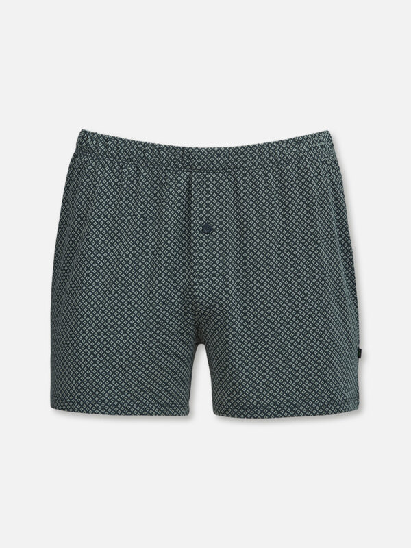 Geometrischer Print in frischem Grün trifft auf höchsten Tragekomfort. Die Vinyard Geo Day Boxershorts bieten einen perfekten Sitz und bestehen aus angenehmer Cotton TENCEL Micromodal Qualität von Lenzing. Besonders weich auf der Haut und perfekt passend zur Nachtwäsche Serie Vinyard Geo – ein stilvolles Essential.