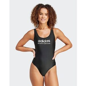 Mit diesem lässigen Badeanzug gleitest du stylish durchs Wasser. Er ist aus recyceltem Nylon mit Stretchanteil und kommt mit einem sportlichen U-förmigen Rückendesign und einem adidas Logo auf der Vorderseite. Ob im Wasser oder beim Sonnen auf dem Handtuch