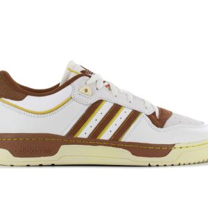 100% Original Adidas !  Herstellerfarbe:  Chalk White / Wild Brown / Hazy Yellow   Obermaterial:  Leder / Textil   Zustand:  Neu  und  Originalverpackt         Dieser adidas Schuh ist die perfekte Mischung aus retro und modern. In den 80ern war der Rivalry auf dem Basketballplatz und in der Sneakerszene einfach nicht zu toppen. Heute ist er ein gefeierter Streetwear-Sneaker mit Kultstatus. Er kommt mit einem Colourway im College-Style und einem cleanen Obermaterial aus Leder. Ein EVA-Einsatz dämpft außerdem jeden deiner Schritte..      Obermaterial aus besten Leder mit adidas Streifen aus Textil.  Sneaker mit B-Ball-DNA.  Schnürung für individuellen Style und optimalen Sitz.  Komfortable Polsterung am Bund und Zunge.  Griffige Laufsohle aus Gummi.  EVA-Einsatz.  Innenfutter Textil.